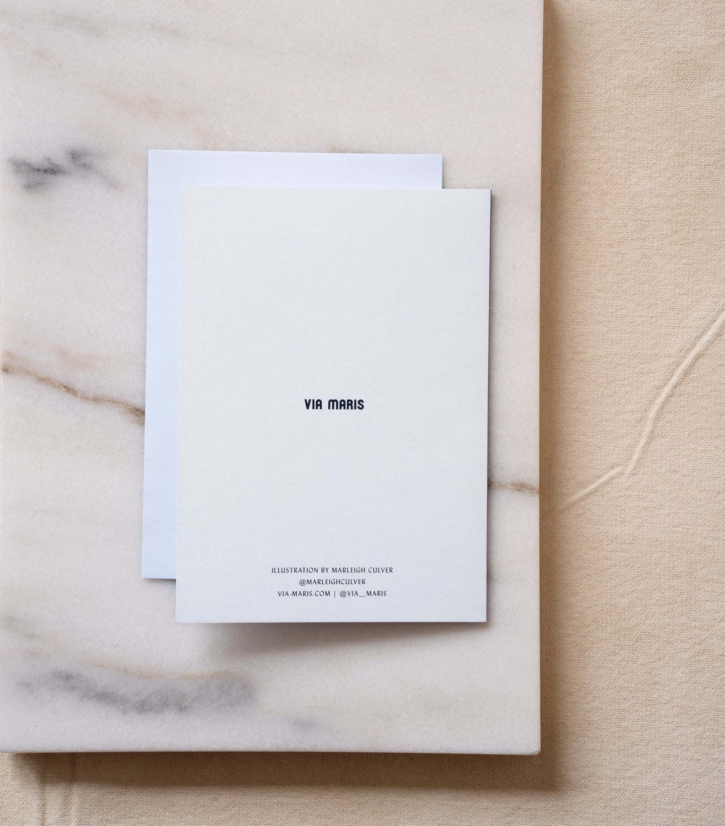 Load image into Gallery viewer, Back of L'Chaim greeting card with Via Maris printed logo