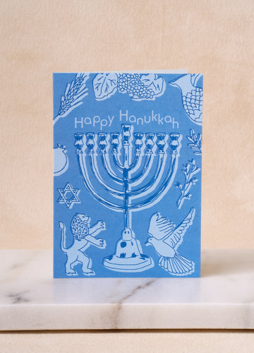 Happy Hanukkah greeting card with menorah design