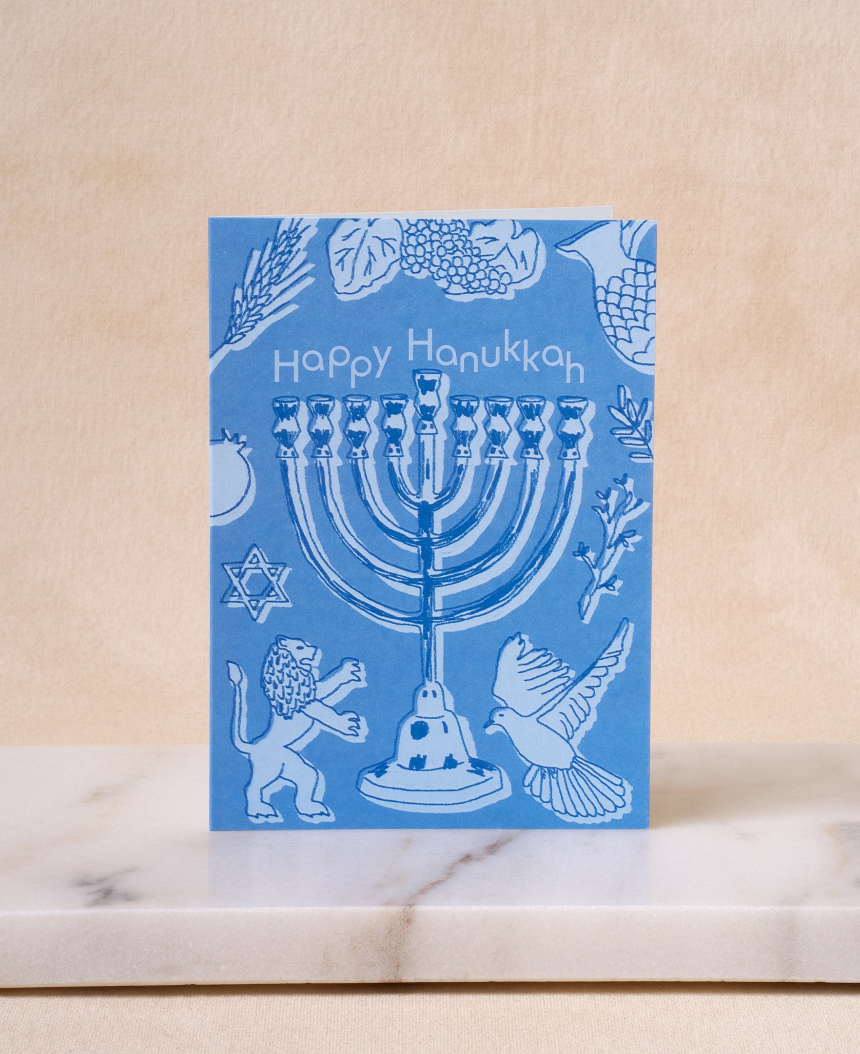 Happy Hanukkah greeting card with menorah design