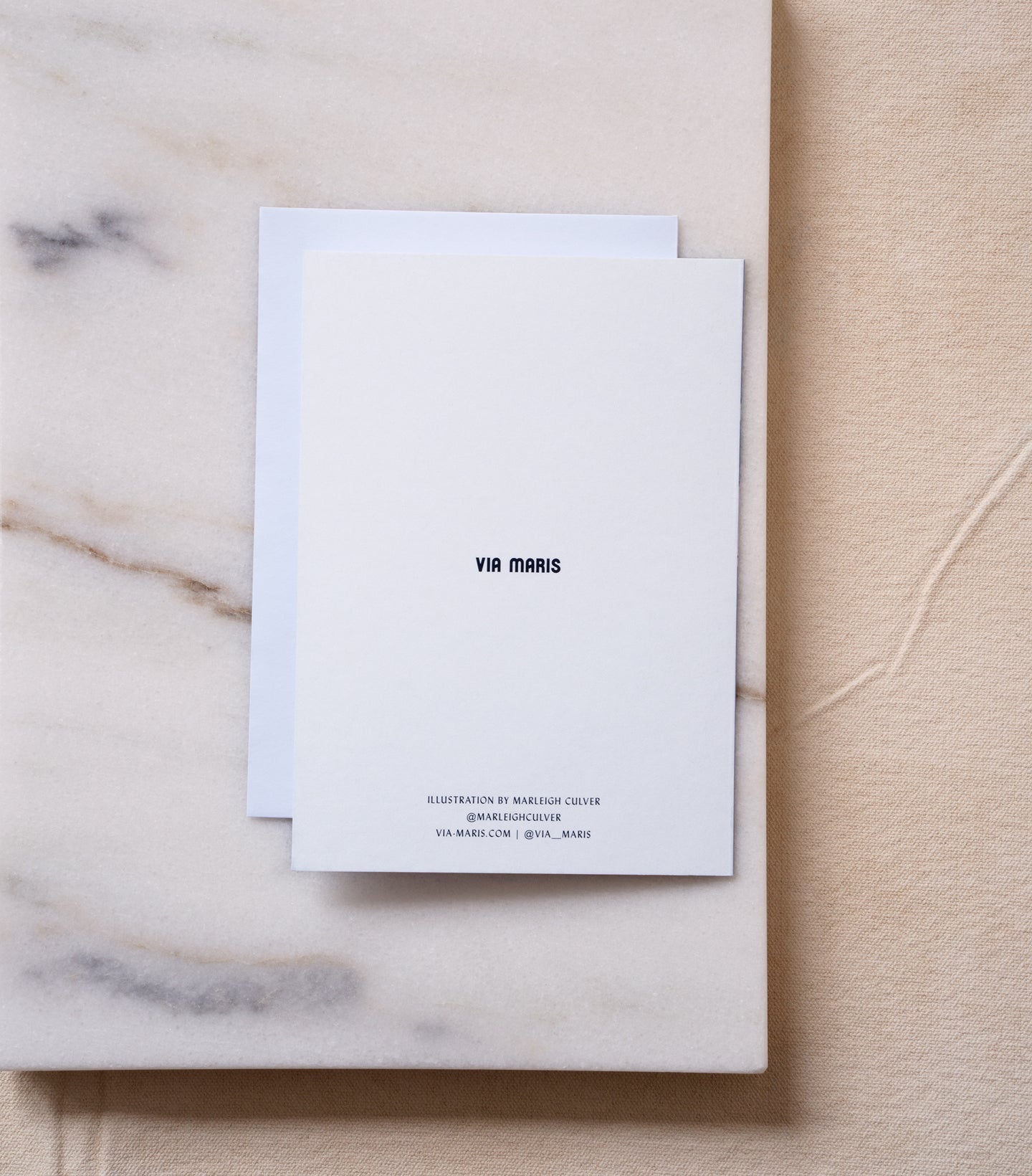 Load image into Gallery viewer, Back of Happy Hanukkah greeting card with Via Maris printed logo
